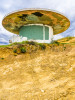 Flying saucer structure on hilltop