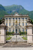 A view of the front of an Italian palace from outside the front gates in Tremezzo Italy on Lake Como. To purchase this image, please go to my stock agency click here.