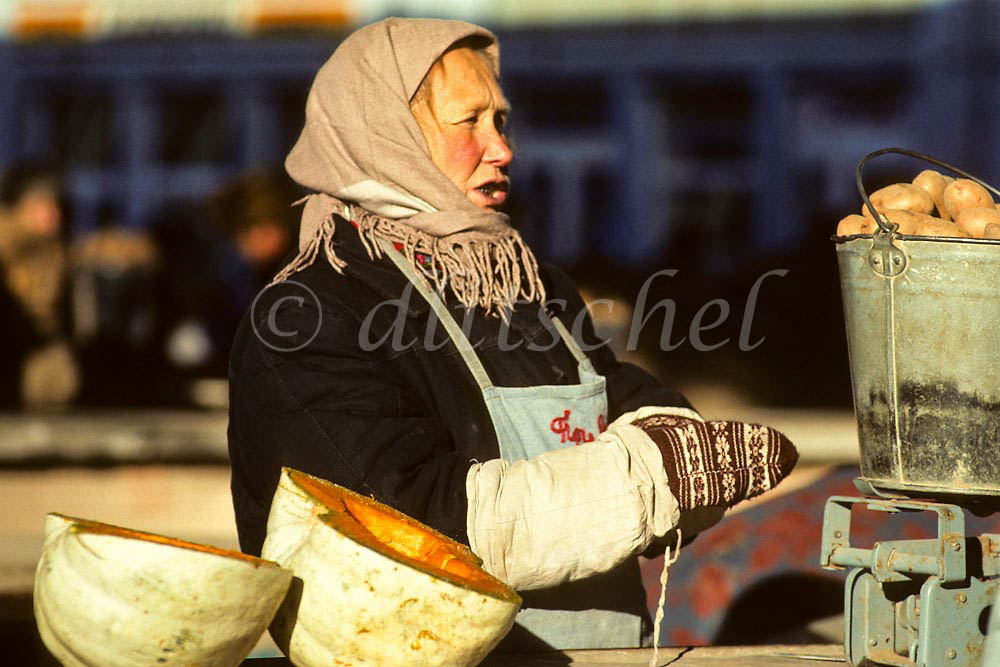 Woman selling at farmer's market, Odessa, Ukraine. To purchase this image, please go to mystock agency click here.