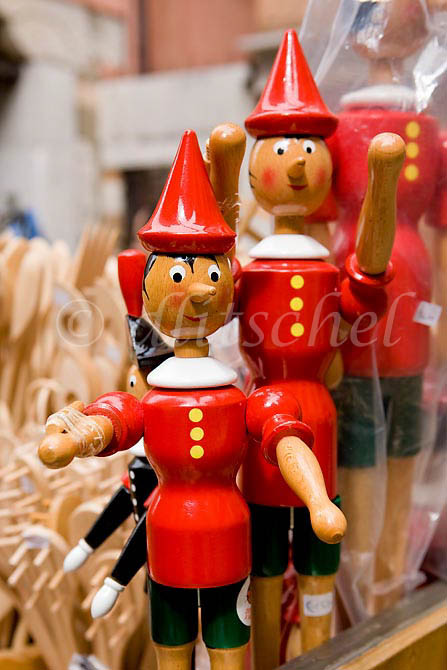 Two wooden pinocchio toys for sale in a Venice, Italy store. To purchase this image, please go to my stock agency click here.