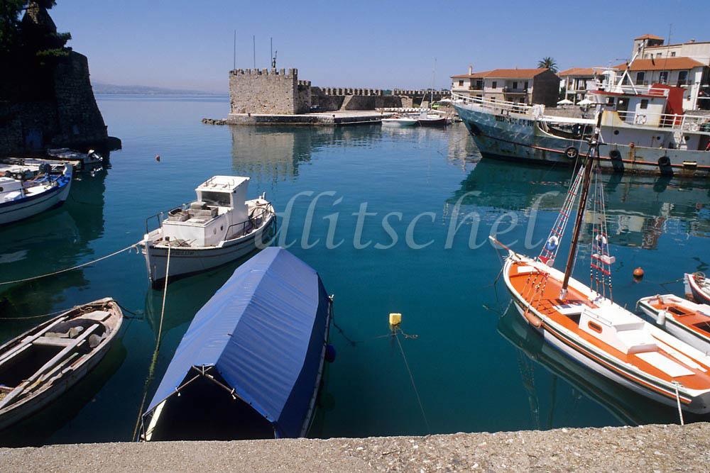 A  view of the harbor at Galaxidi, Greece. Galaxidi, Greece is a popular historical fishing village located in central Greece close to Delphi. To purchase this image, please go to my stock agency click here.