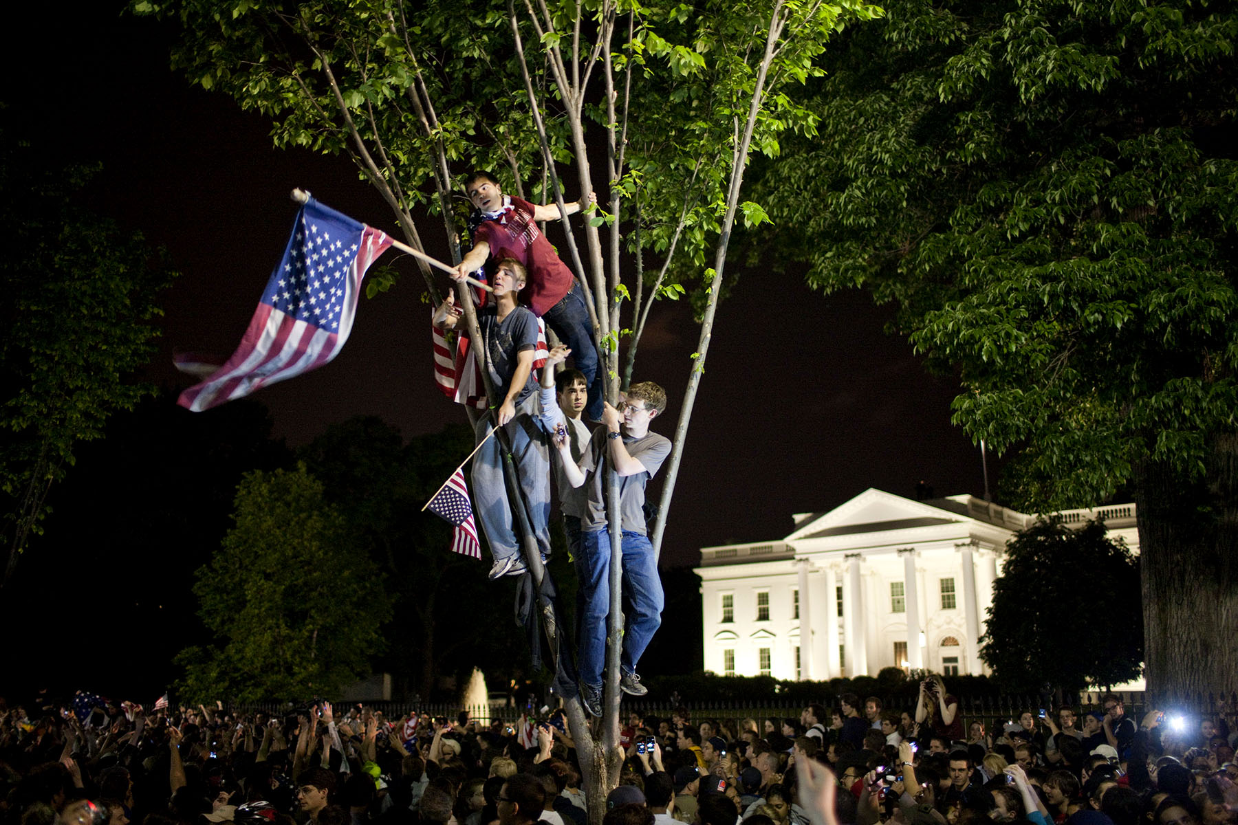 Crowds celebrate on Pennsylvania Avenue in front of the White House in Washington, after President Barack Obama announced that Al-Qaida's leader Osama bin Laden had been killed.