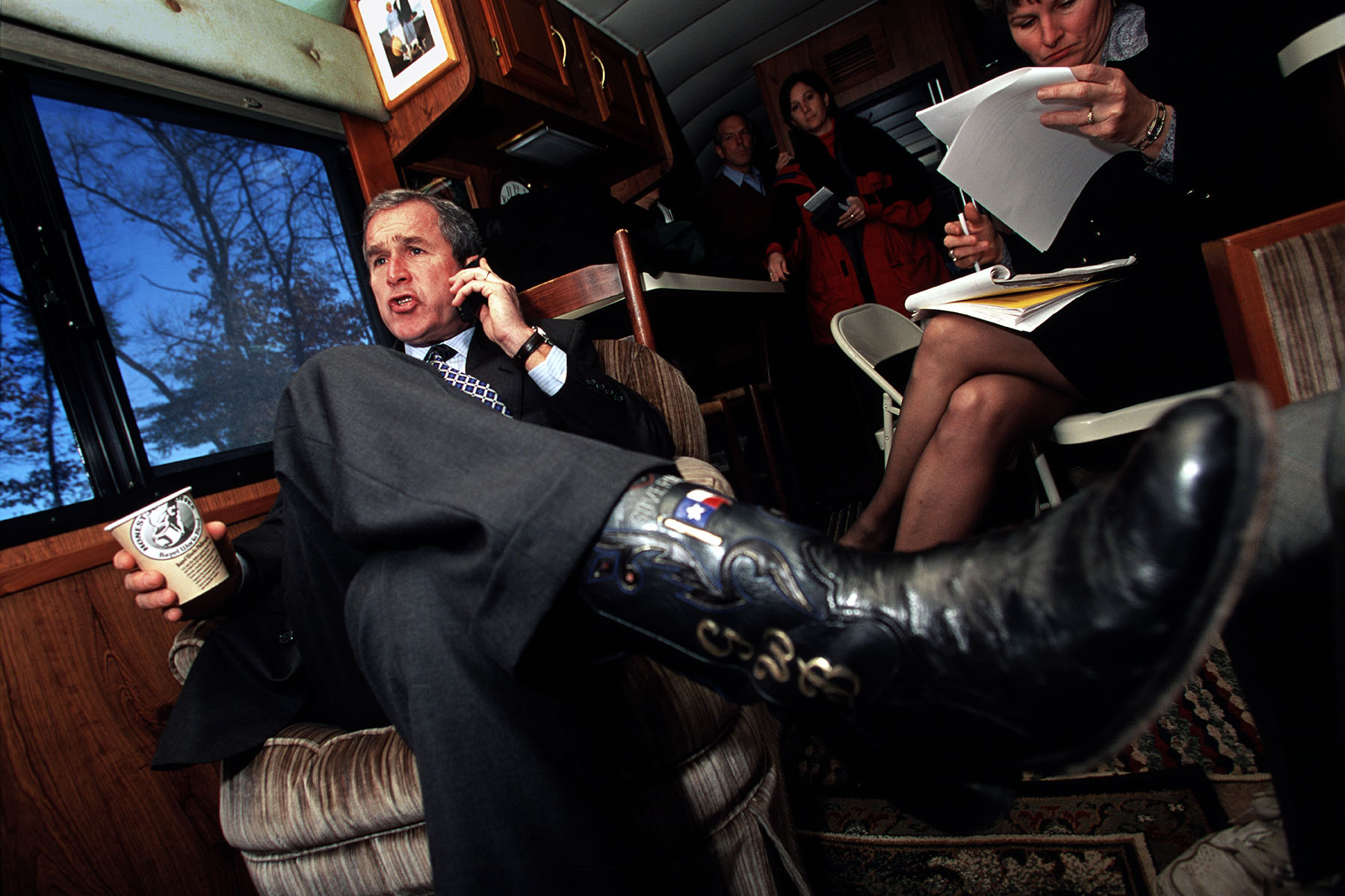 Republican presidential candidate George W Bush on his campaign bus in New Hampshire.