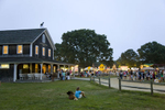 Fair goers at the 147th annual Martha's Vineyard Agricultural Society Fair.   The annual event brought traditional livestock contests, racing pigs, rides and more to island off Cape Cod in Massachusetts. Photo by Brooks Kraft/Corbis