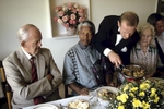 Nelson Mandela is served lunch at the home of a wealthy white land owners during his campaign for President.  After more then 27 years in jail as an anti-apartheid activist,   Nelson Mandela lead a 1994 campaign for President as a member of the African National Congress (ANC),  in the first free elections in South Africa in 1994.  Mandela has received more than 250 awards over four decades, including the 1993 Nobel Peace Prize.