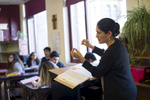 Part-time teacher Rosa Walke comments on a presentation made by a group of students during an AP Spanish Class at Cristo Rey Jesuit High School, October 19, 2016.
