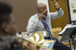 Music Department Chair and Band Director Gerald Powell conducts during a sectional meeting of the Intermediate Band class at Kenwood Academy High School, November 2, 2016.