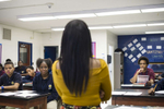 Biology teacher Kyera Bradley discusses the definitions of different kinds of symbiotic relationships during a freshman biology class at Noble Charter Schools - Johnson College Prep, November 8, 2016.