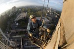 Wesley Shirley does routine maintenance on the chimney of Notre Dame's power plant. 
