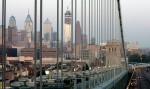 View of Philadelphia's skyline from the Ben Franklin Bridge with the Comcast Center under construction. It took approximately 9,200 pieces of steel to complete the building's structural framework.The largest girder was 90,000 lbs., (45 tons) and the total tonnage was approximately 12,500. 