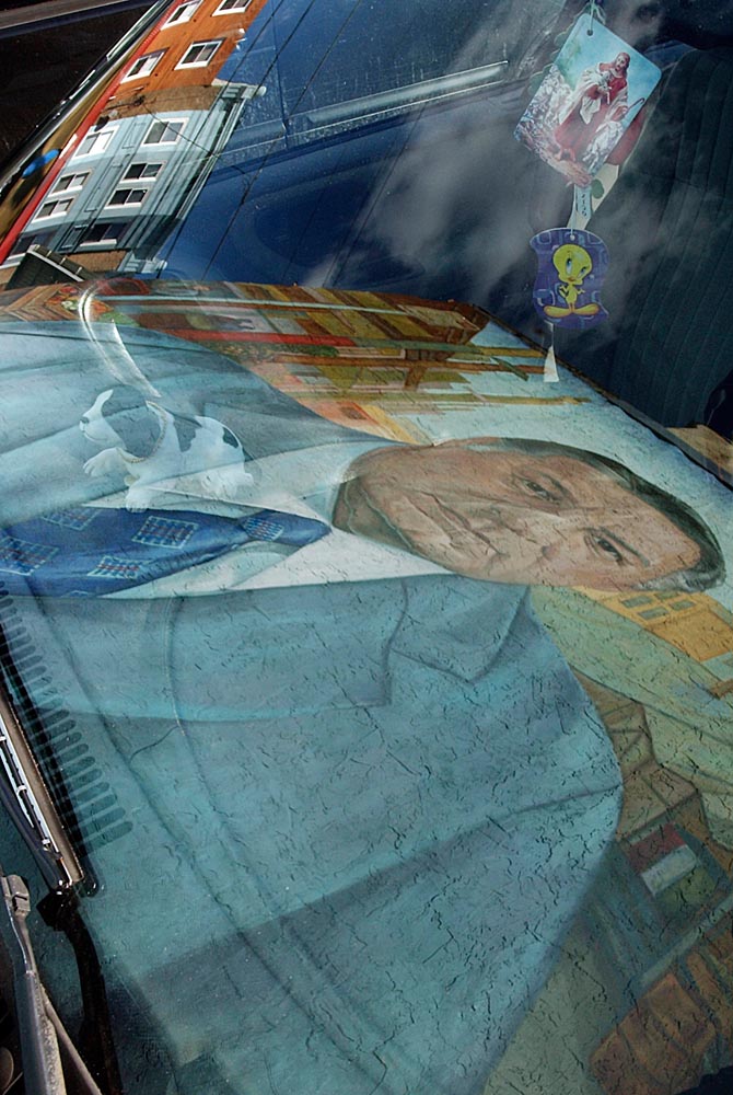 A mural of  former Mayor Frank Rizzo is reflected on the windshield of a vehicle at Ninth and Montrose Streets in the Italian Market on February 23, 2005. Diane Keller painted the mural on the side of a three-story building in 1995.