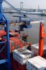 A 200-foot high dock gantry land crane lifts a 20-foot container off a vessel at the Packer Avenue Marine Terminal.