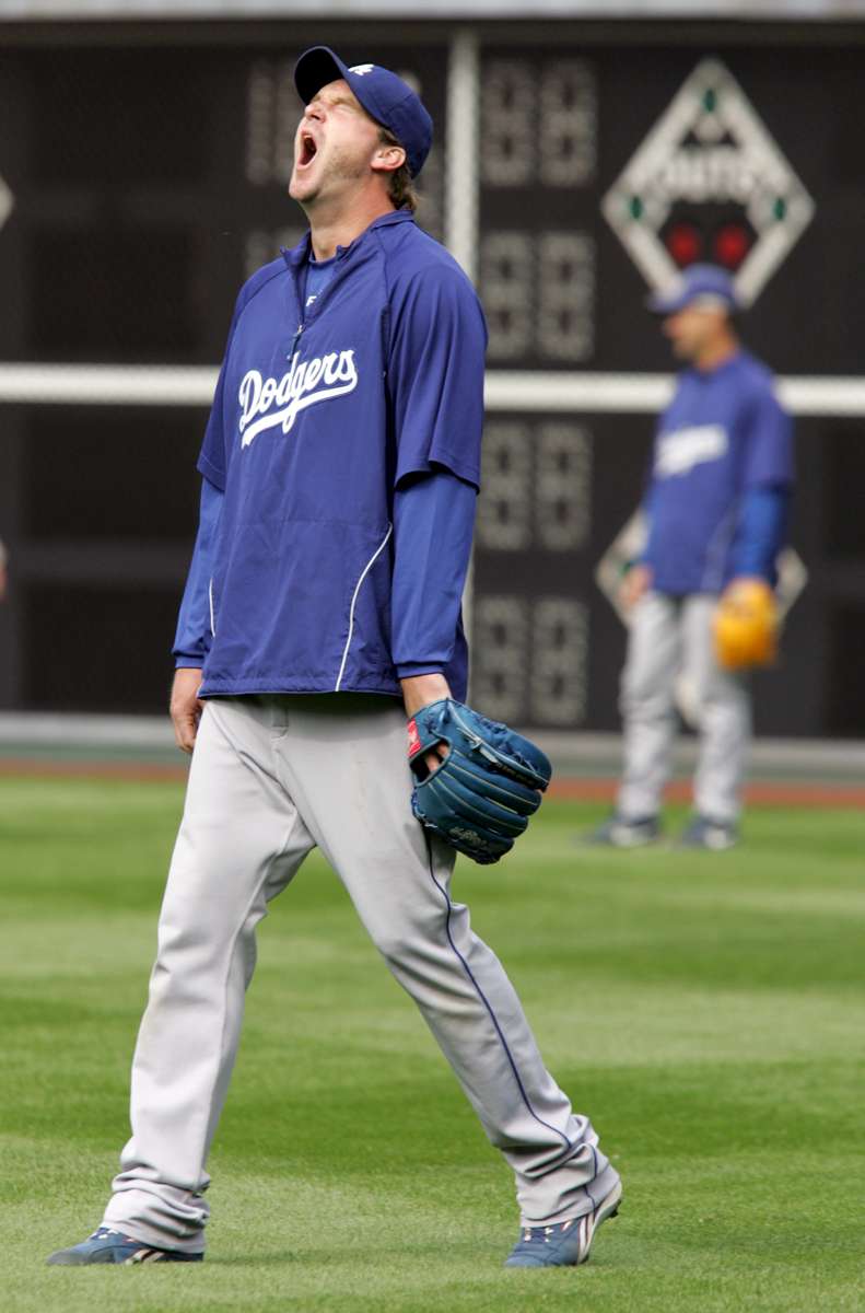 Los Angeles Dodgers pitcher Derek Lowe yawns during warm ups prior to the first game of the National League Championship Series against the Philadelphia Phillies at Citizens Bank Park on October 8, 2008. 
