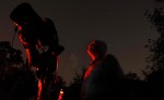 Astrophotographer  Michael Covington looks up at Comet Holmes outside of his Athens home on Thursday, November 1, 2007.