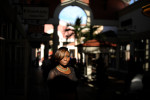 Jessica Price, of Orlando, Fla., walks to her job at an outlet mall on Friday, February 1, 2013 in Orlando, Fla. (David Manning for The New York Times)