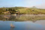 Lake Nicasio at about 6:30 in the morning on April 16th. Early morning fog burning off the lake. Photo by Jay Graham
