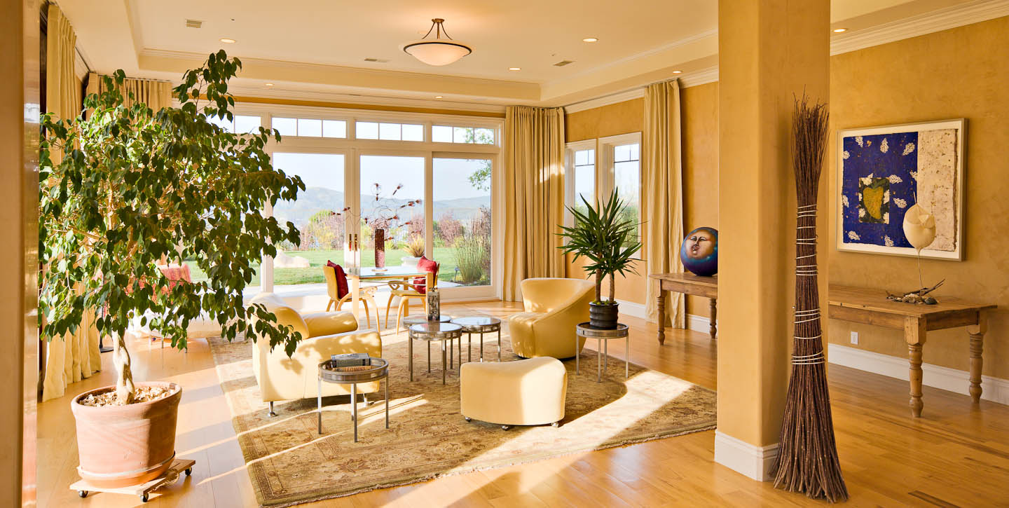 Stunning family room with pecan floors and San Francisco Bay and Golden Gate Bridge views.Photo by Jay Graham for Decker Bullock Sotheby's International Realty