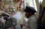 Soldiers of Afghanistan warlord Kamal Khan occupy and hide inside the governor's mansion in Khost, Afghanistan. warlords 