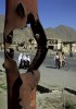 School children and pedestrians walk through the bombed out district of Kart-e-seh in Kabul, Afghanistan. 