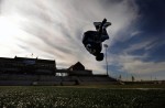 Valor Christian High School's Le-Len Lang does a back flip in the center of the field before his team plays Conifer High School Friday 09/18/09 in a 3A matchup at Valor Christian in Highlands Ranch, Colo.  Photo by Matt McClain