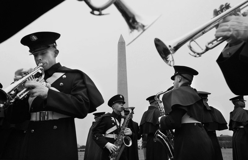 Members of the Virginia Tech cadet marching band rehearse next to the Washington Monument in Washington, D.C.  Photo by Matt McClain