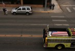 A Monte Vista fire truck carrying the coffin of Srgt. Glen Martinez, 31, drives through the Main St. of Monte Vista, Colo. following the Srgt.'s funeral.  Photo by Matt McClain 