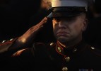 Srgt. Ethan E. Rocke of the Marine Corps Recruit Depot in San Diego cries while he salutes Ronald Reagan as taps is played at the burial ceremony for the 40th President of the United States at his library in Simi Valley, Calif.  Photo by Matt McClain