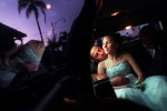 Jennifer Hillman , 17, rides in a limousine with her prom date, Andres Moraza, 17,  on their way to Gisella's Italian Restaurant in Santa Barbara, Calif. before attending their Ventura High School prom.  Photo by Matt McClain