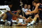 University of Colorado women's basketball team's Brittany Spears, left, tries to grab the ball from teammate, Alyssa Fressle after she stole the ball from Paulisha Kellum of  the University of Virginia Saturday 01/02/10 at the Coors Event Center in Boulder, Colo.  Virginia came into the game ranked in the top 25.  Photo by Matt McClain 