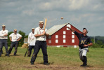 Rich {quote}Fingers{quote} Effinger, left, of the Atlantic Base Ball Club of Brooklin takes his turn at the plate as Jay {quote}Udderguy{quote} Kauflie, right, of the Hog and Hominy Base Ball Club of Tennessee makes a throw to second base to try to get a runner out during the Gettysburg National 19th Century Base Ball Festival on Saturday July 18, 2015 in Gettysburg, PA. Effinger's team is based in Smithtown, NY. The team pays tribute to a nineteenth century team called the Brooklyn Atlantics. (Photo by Matt McClain/The Washington Post)