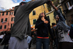 People dance as theyand others celebrate the reopening of a business on Sunday May 19, 2013 in Vernazza, Italy.  The area experienced significant damage from a 2011 flood.  (Photo by Matt McClain/ The Washington Post)