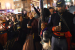 Louis Carter, right, and others gather outside Ford's Theatre in remembrance of the 150th anniversary of President Abraham Lincoln being assassinated on Tuesday April 14, 2015 in Washington, DC. Lincoln was shot at Ford's Theater on the night of April 14, 1865. He died on the morning of April 15, 1865. (Photo by Matt McClain/ The Washington Post)