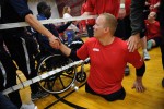 Travis Greene, center, is congratulated following a volleyball match for the Marines against Navy during the 2010 Warrior Games for wounded soldiers on Wednesday 05/12/10 at the U.S. Olympic Training Center in Colorado Springs, Colo.  Photo by Matt McClain