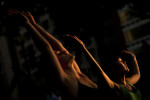 Alexandra Scott, left, and Yukari Usuda, right, are bathed with late afternoon light as they take part in {quote}Yoga in the Park{quote} at Dupont Circle which is sponsored by Lululemon Athletica on Wednesday September 05, 2012 in Washington, DC.  (Photo by Matt McClain for The Washington Post)