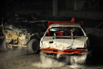 Bill Orndorff, right, competes in the demolition derby at the Shenandoah County Fair on Tuesday August 28, 2012 in Woodstock, VA.  