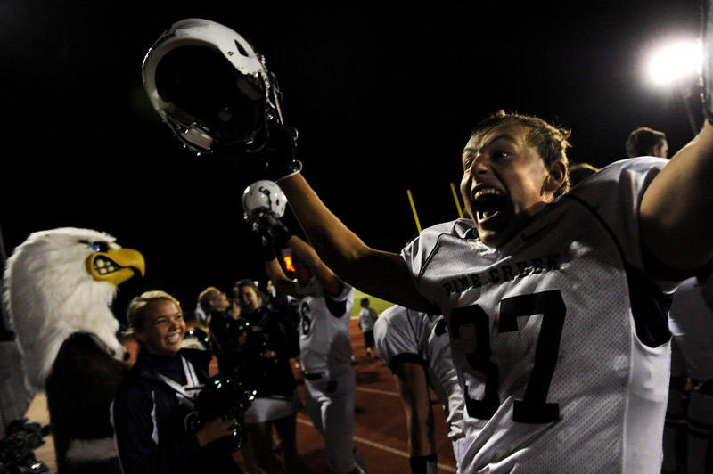 Pine Creek's Sam Norton celebrates his team's 13-3 victory against Fountain-Fort Carson at Fountain, Colo. on Friday 09/24/10.  Photo by Matt McClain