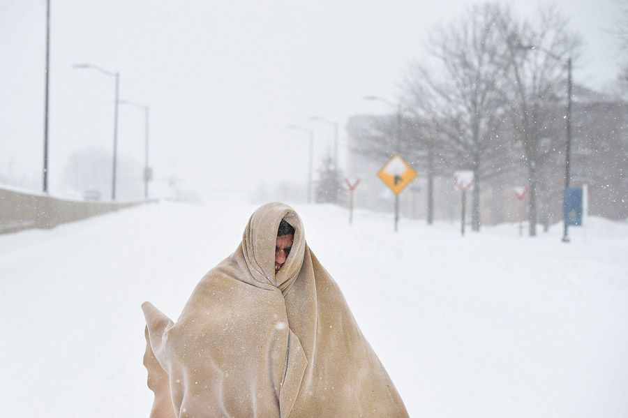 Michael Bond walks on Highway 50 on Saturday January 23, 2016 in Arlington, VA. A large snow event was being predicted for Washington, DC area. (Photo by Matt McClain/ The Washington Post)