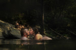 Satchal McClellan, 19, kisses Alexis Chamot, 18, as they cool off in Passage Creek within the George Washington National Forest outside of Front Royal, VA on Thursday August 02, 2012.  There are other swimming holes in Passage Creek in close proximity.  (Photo by Matt McClain for The Washington Post)