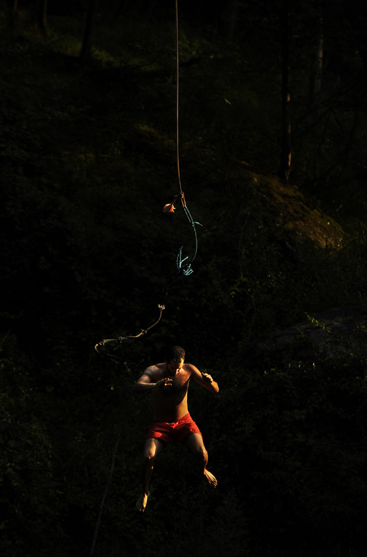 Tony Prilola uses a rope swing to launch himself into the Patapsco River in Carroll County, MD on Monday July 16, 2012.  The swimming spot has a rope swing.  (Photo by Matt McClain for The Washington Post)