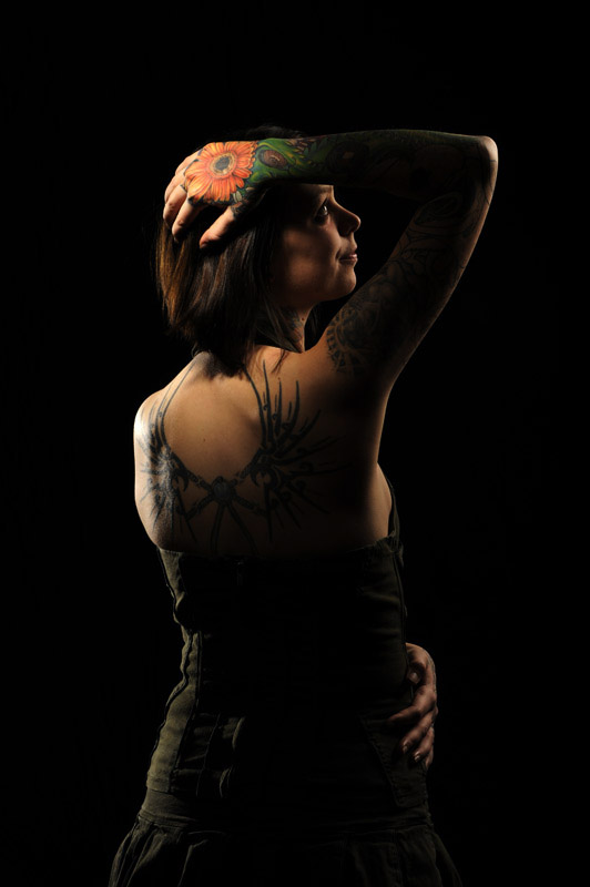 Melissa {quote}Bunny{quote} Dias, 29, of Philadelphia, PA shows off some of her thirteen tattoos that decorate her body as she poses for a portrait while taking part in the 2011 DC Tattoo Arts Expo at the Doubletree Hotel Washington DC- Crystal City in Arlington, VA on January 14, 2011.  She says that some of her tattoos are strictly esthetic while a few are more meaningful and symbolic. The event concludes Sunday and includes over 100 tattoo artists.  (Photo by Matt McClain/The Washington Post)