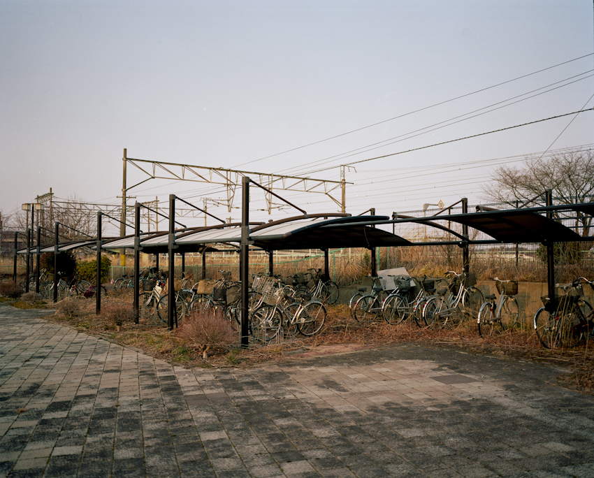 Abandoned bicycles remain as they were left on 3.11.11 at the train station in the town of Odahka, which lies about 6 miles from the Daiichi nuclear power plant. Mar. 2014