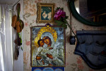 The Madonna and the Christ child hang on the wall, at the home of Ungelfug Gennadiy Rihardovich. Korotkeros, Russia. 
