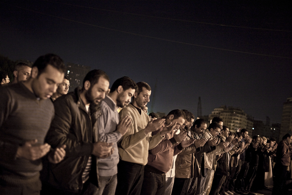 Egyptians take part in daily prayers at Tahrir Square on the 17th day of demonstrations. Cairo, Egypt. Feb. 10, 2011.