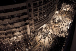 Thousands of Anti- government demonstrators rush the streets heading into Tahrir Square, after hearing news President Hosni Mubarak has resigned. Cairo, Egypt, Friday, Feb. 11, 2011