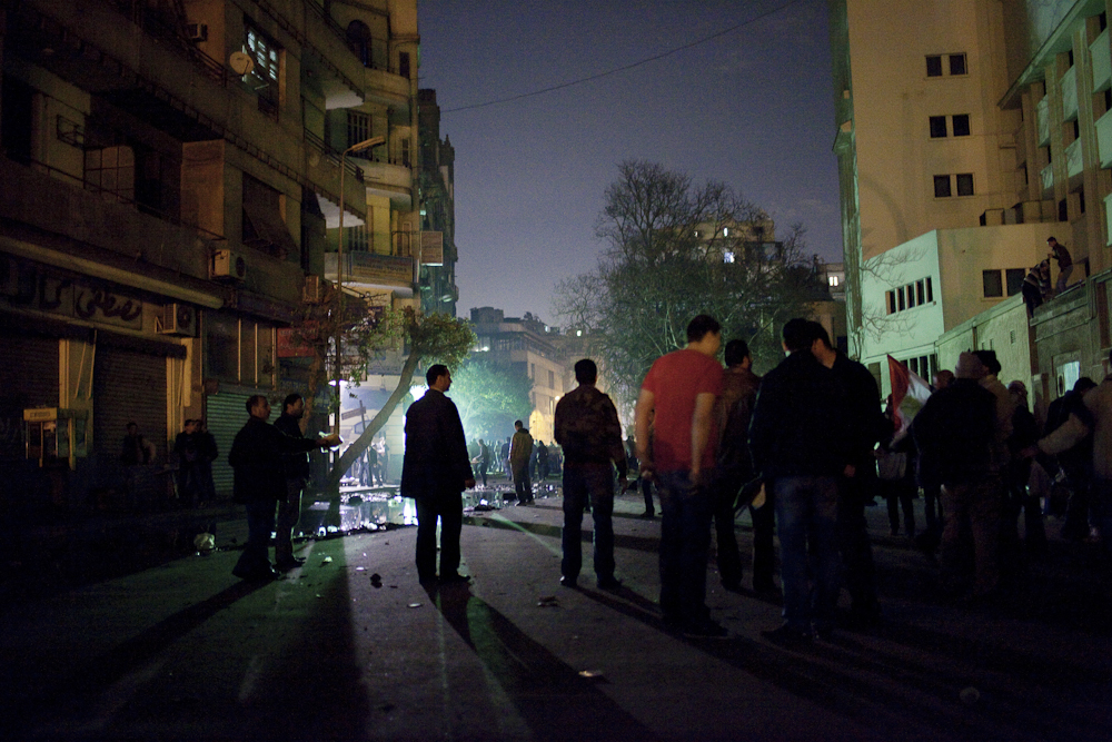 Anti-government protesters stand guard on Mohamed Mahmoud street near Tahrir Square, Cairo, Feb. 10, 2011