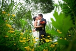The bride and groom kiss following their Cedarbrook Lodge wedding in Seattle, Washington. (Wedding Photography by Scott Eklund - Red Box Pictures)