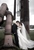 Silvia and Adrian embrace during a portrait among the exposed pipes at Gasworks Park in Seattle prior to their wedding. (Photo by Scott Eklund/Red Box Pictures)