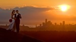 Pauline and Scott check out the view of the Seattle skyline at sunset from the Golf Club at Newcastle. (Photography by Scott Eklund/Red Box Pictures)