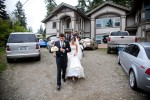 Adrian leads Silvia down a slope from her house to their waiting limousine in Bothell, WA. They were off to take pictures and go on to their wedding reception. (Photo by Andy Rogers/Red Box Pictures)