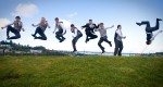 groomsmen-jumping-flipping-kite-hill